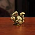 Bronze Squirrel Sat With Acorn