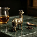 Alfie the Alpaca bronze figurine on green marble