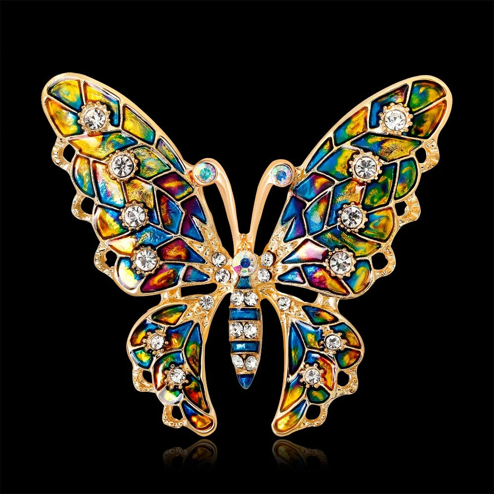 The Stained Glass Butterfly Brooch on a black background