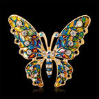 The Stained Glass Butterfly Brooch on a black background